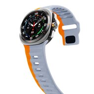 Wave siliconen bandje - Grijs met oranje - Samsung Galaxy Watch Ultra 47mm